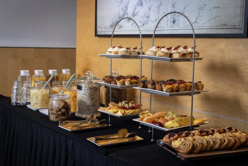 Chartroom continental breakfast buffet with pastries, fruit, cereals and juices.